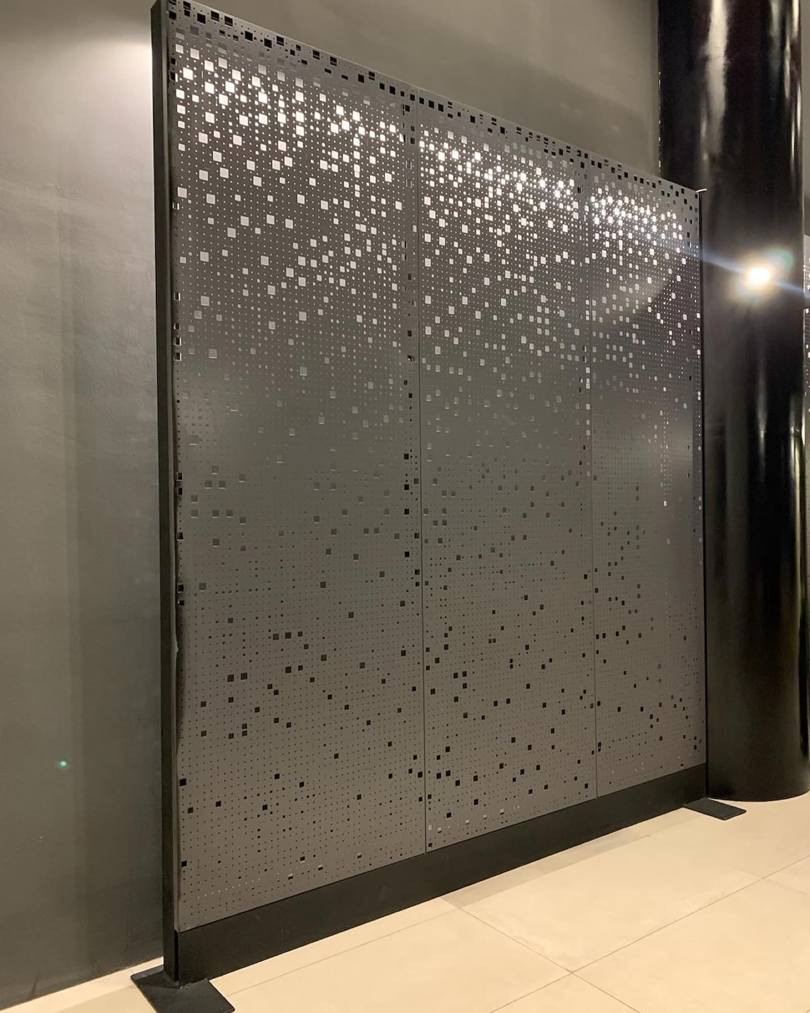 Perforated metal feature screen